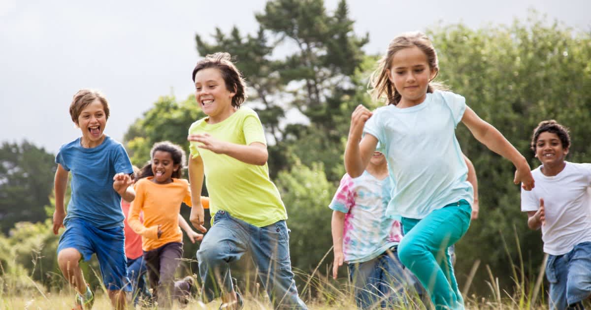 Children running on a field