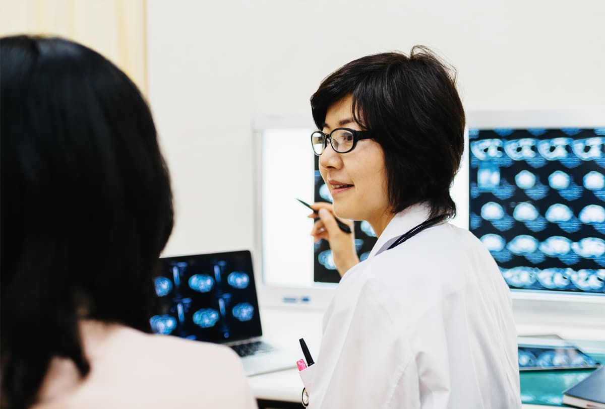 Woman talking in a lab