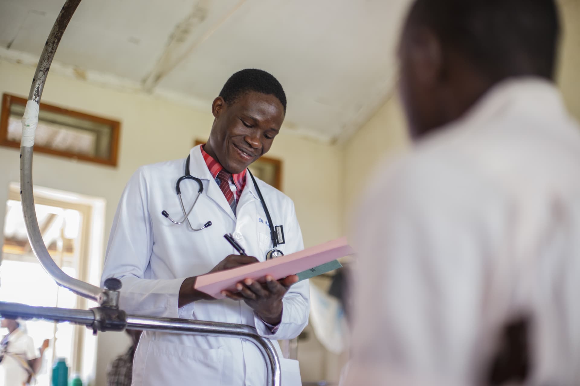 Doctor make rounds and take notes