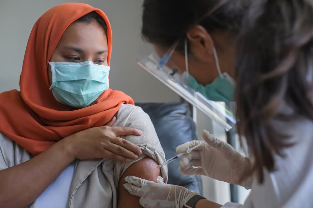 Patient receiving a shot