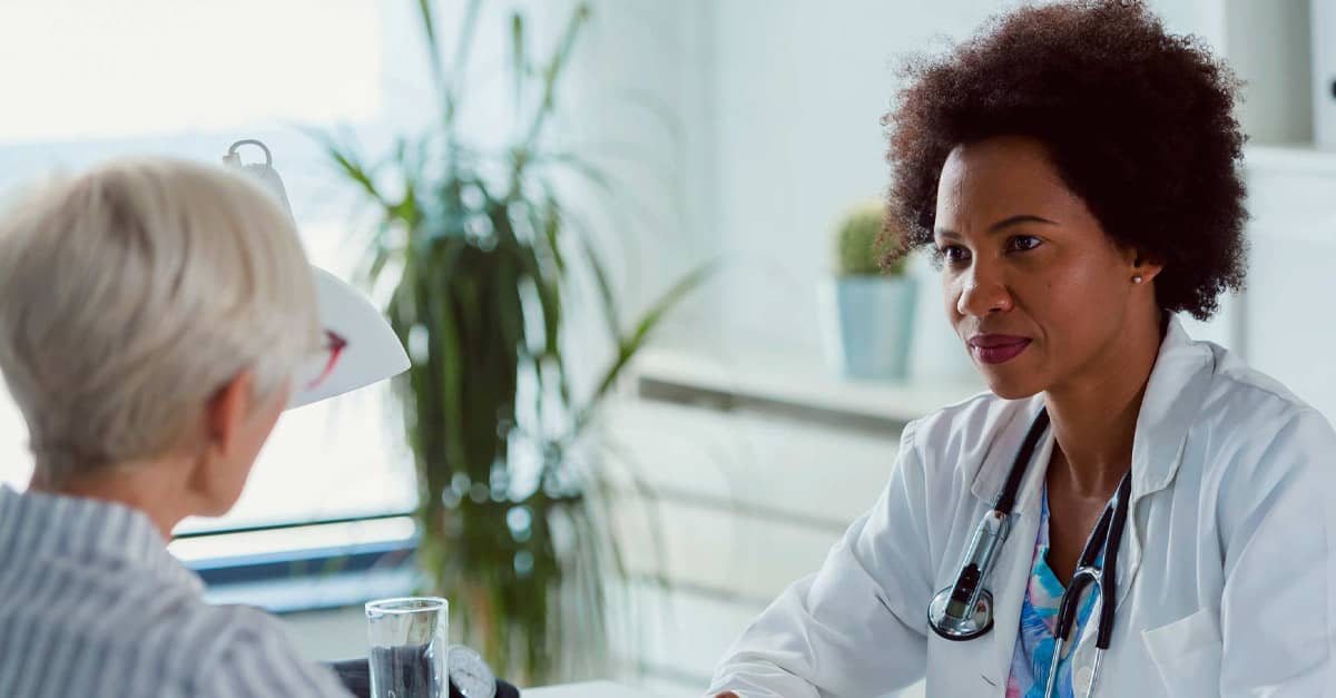 Doctor talking to patient