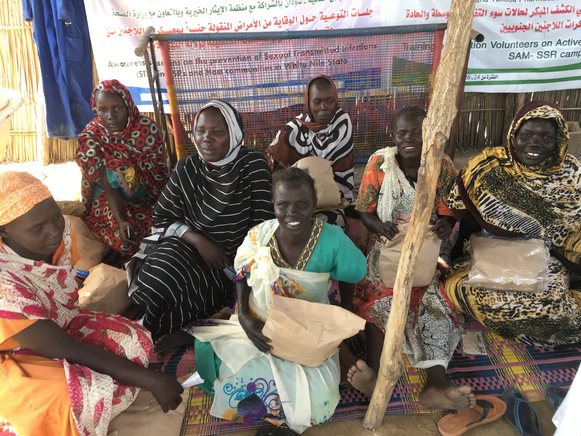 Refugee camp in Sudan_Women receiving sanitary napkins