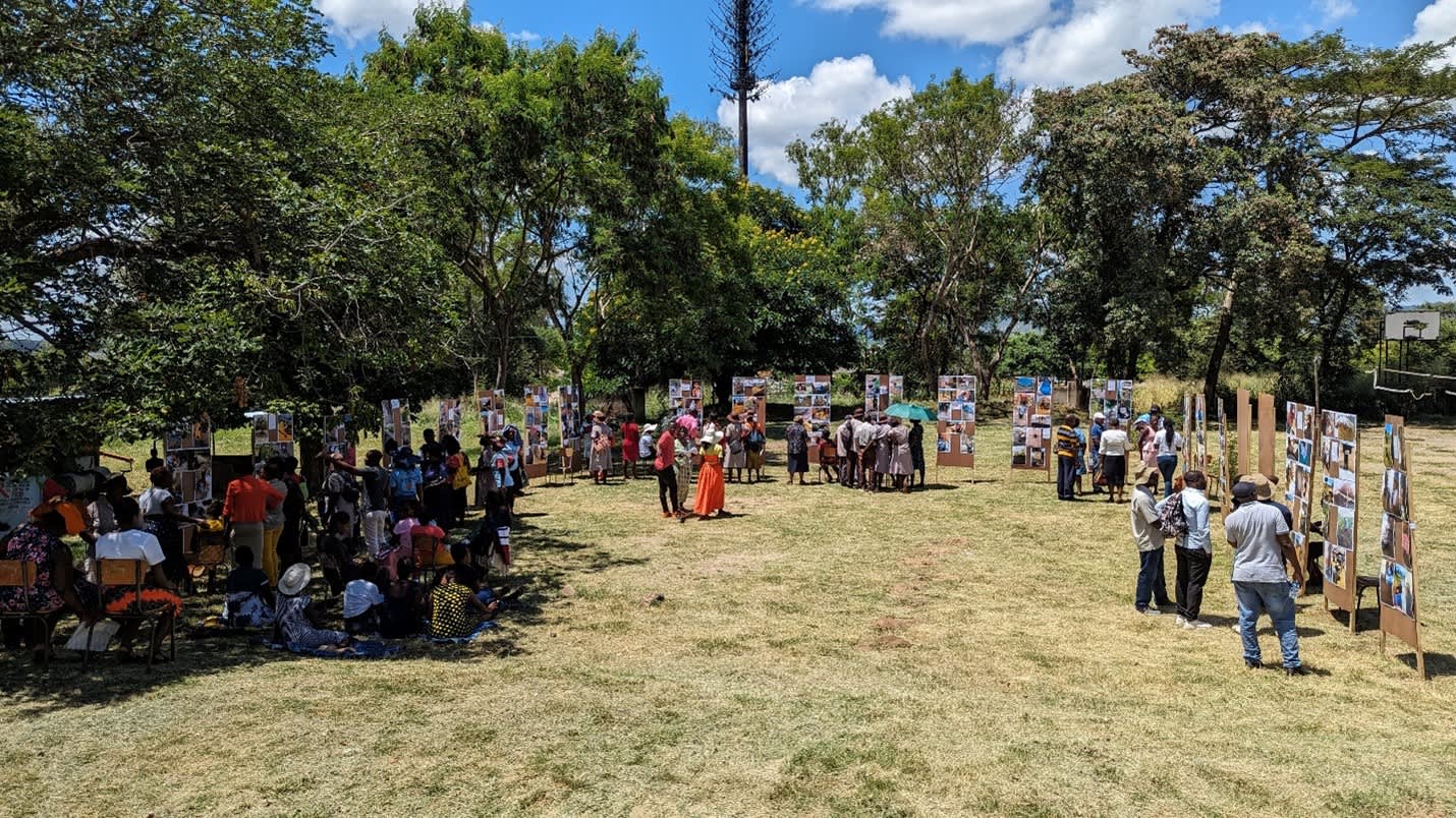 Mothers present photos documenting the impact of heat in their communities.