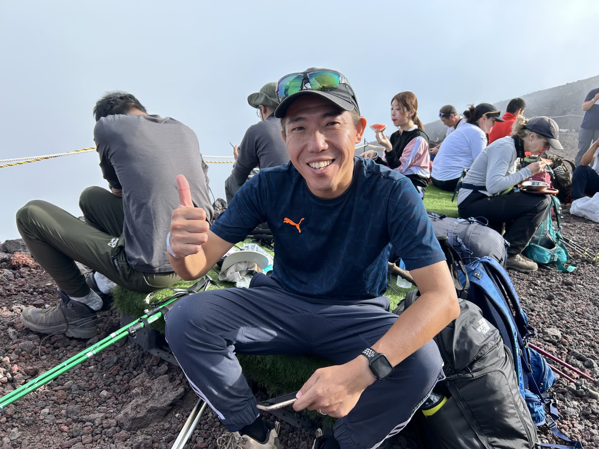 Man posing for picture while hiking