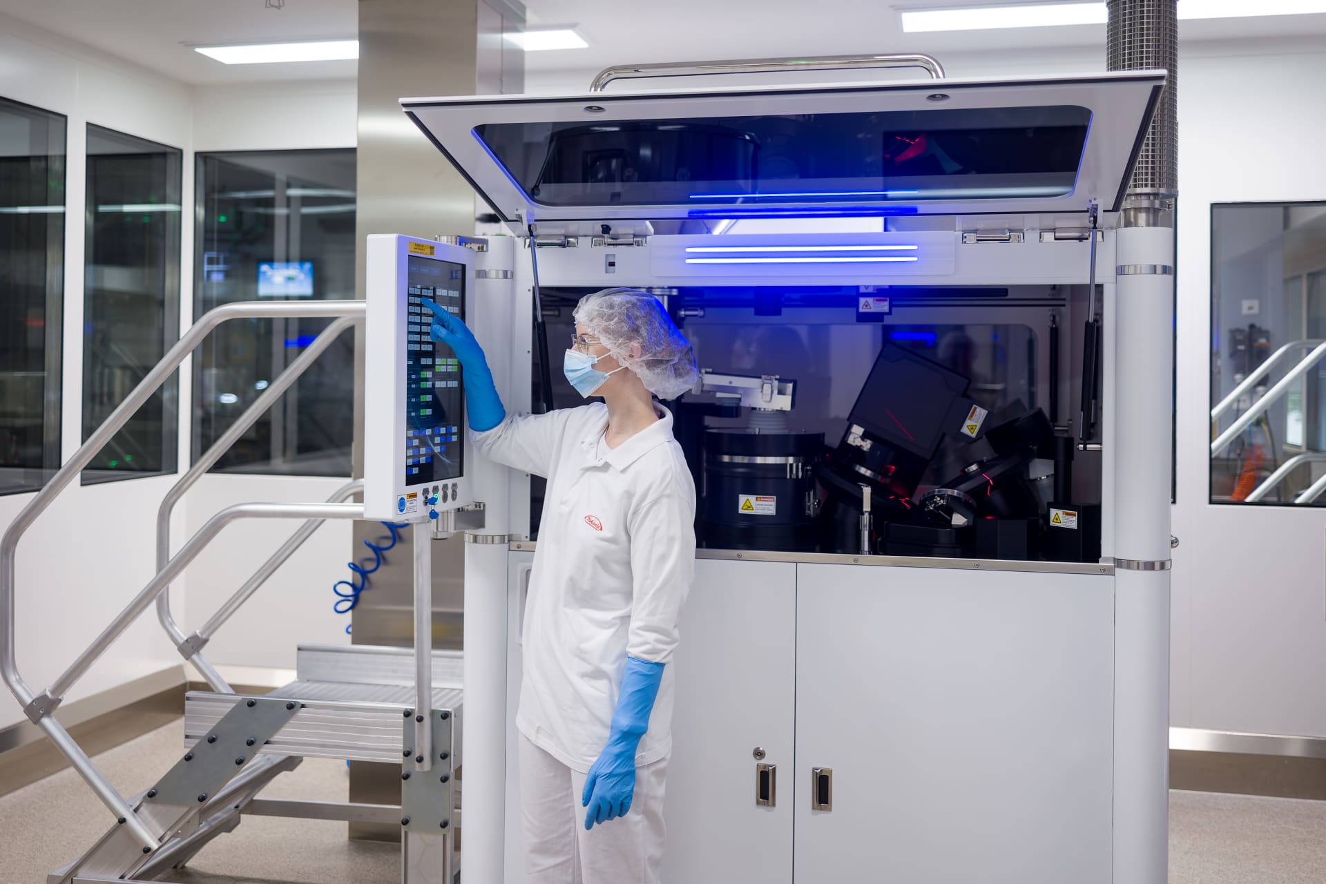 A person wearing a mask and gloves