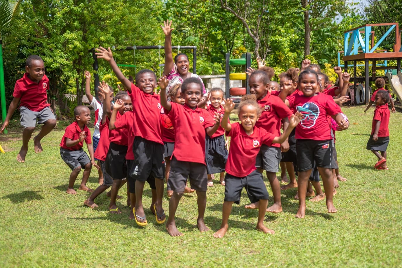 A group of children smiling