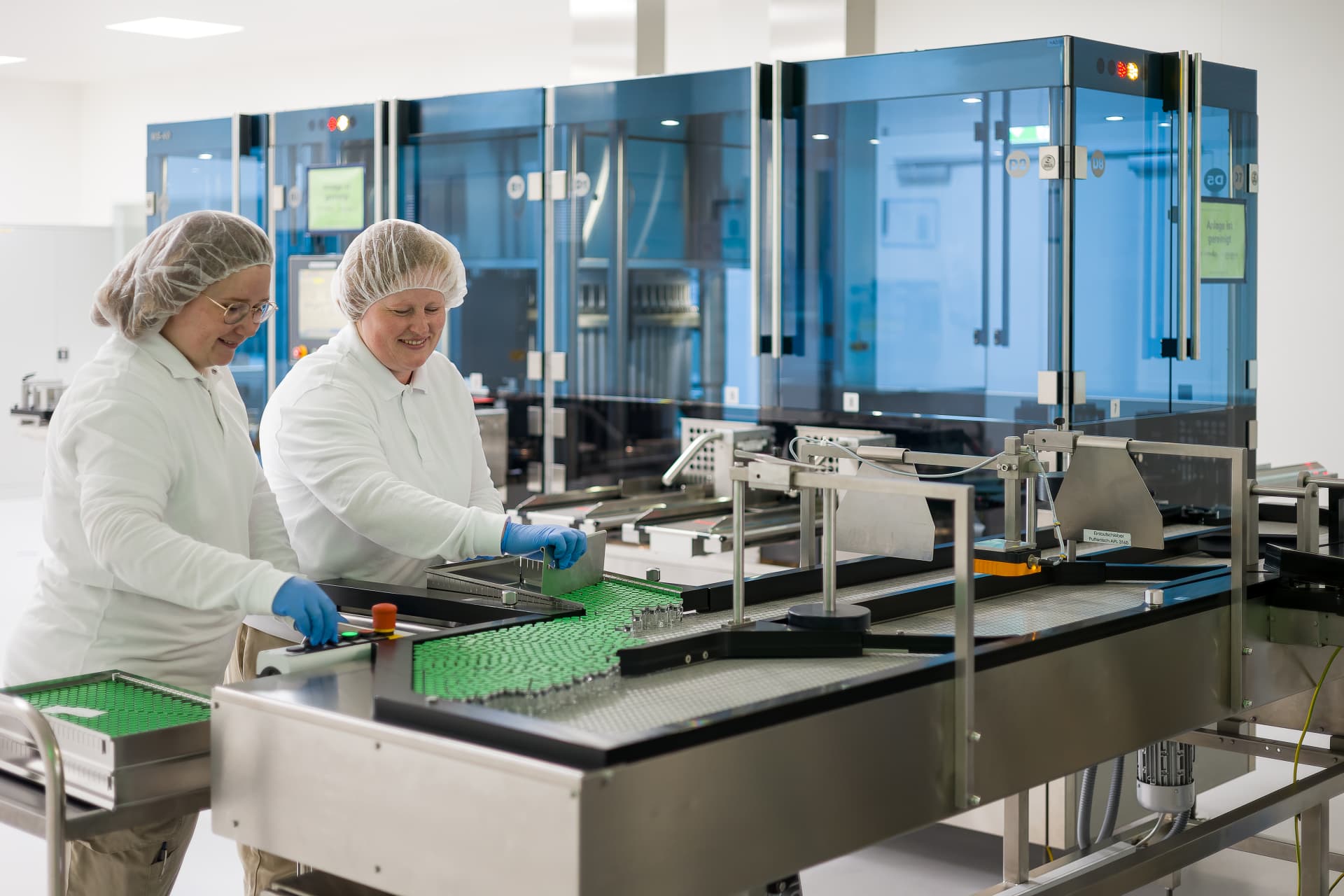 Two workers in a manufacturing facility
