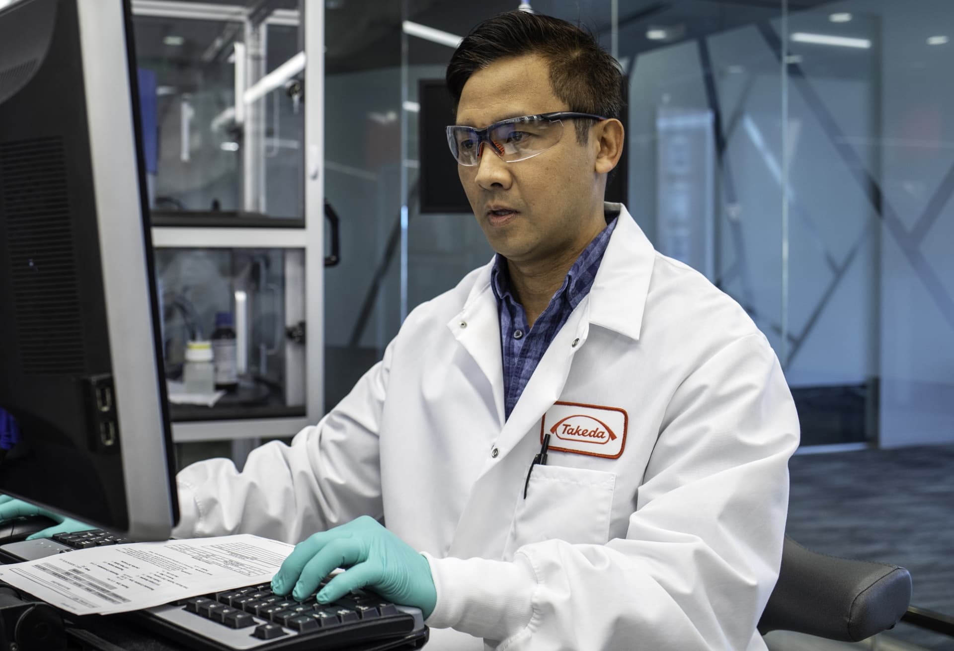 lab worker at computer