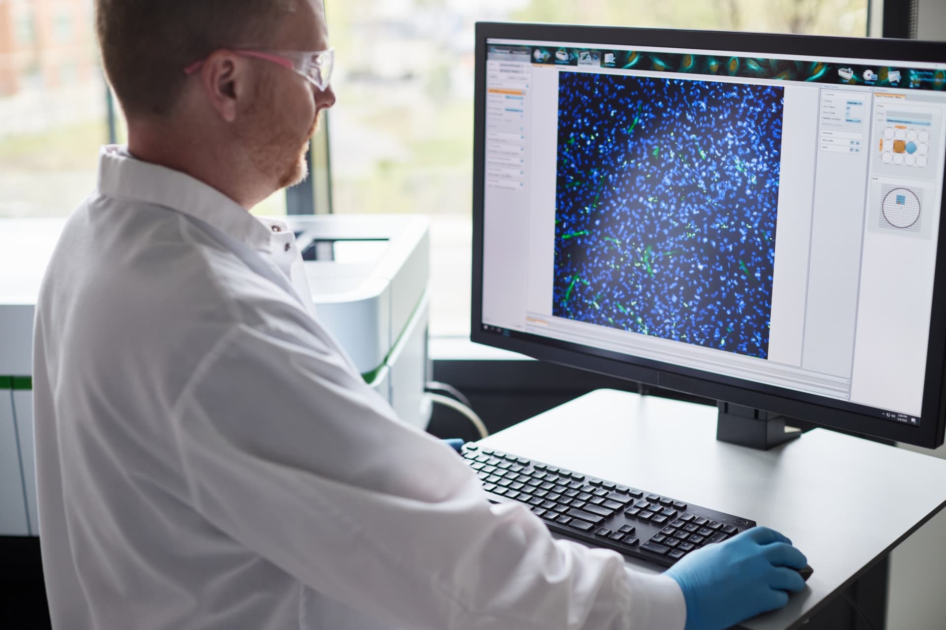 Man working with computer in lab