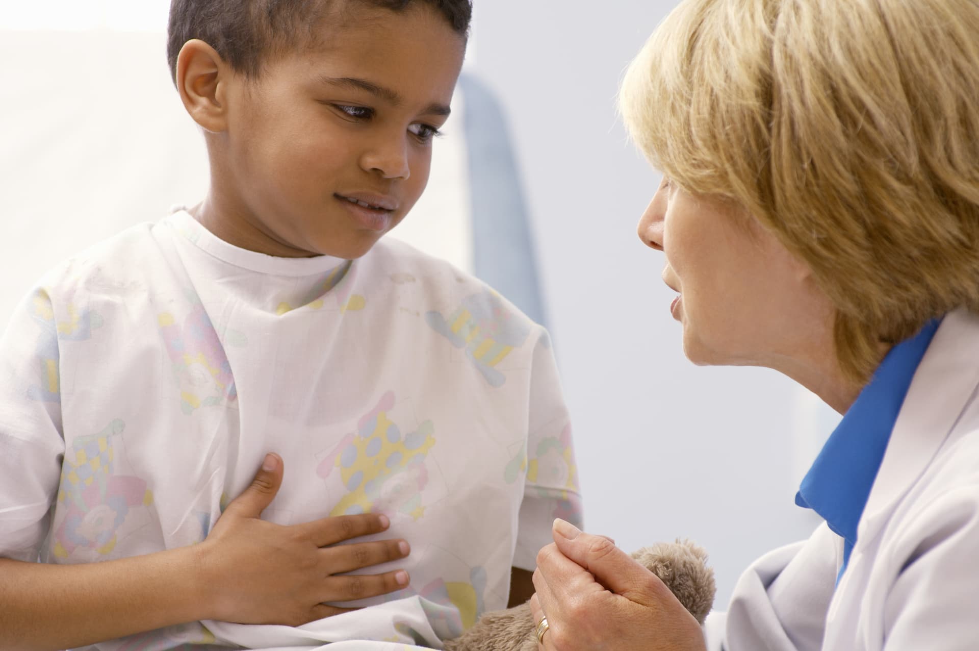 A person talking to a child
