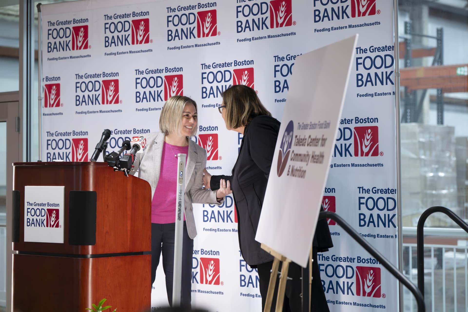 Rhonda Pacheco and Catherine D'Amato talking.