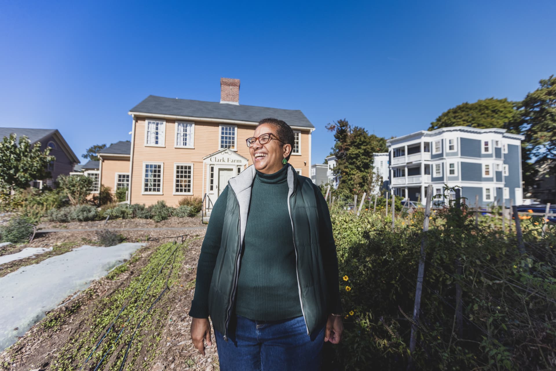 Patricia Spence, president and CEO of Urban Farming Institute, smiles while at the farm stand.