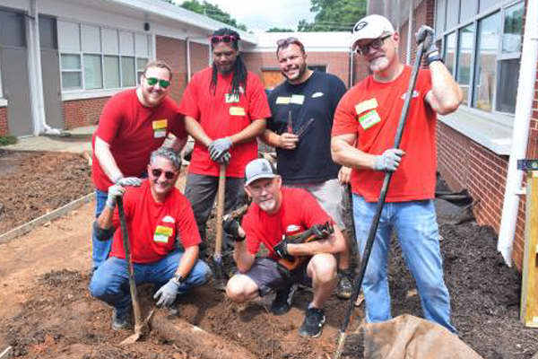 six people doing social work