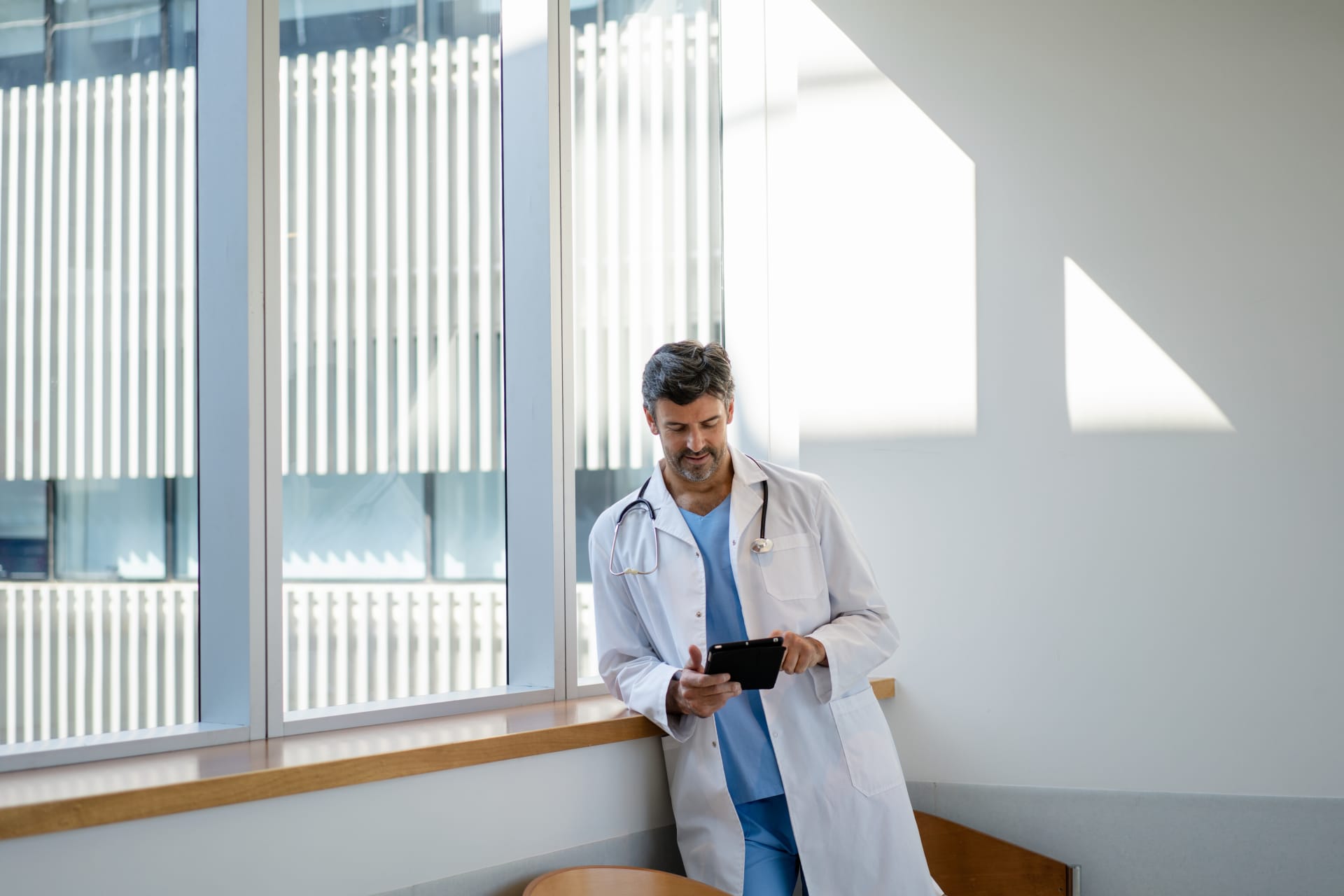 HCP looking at tablet