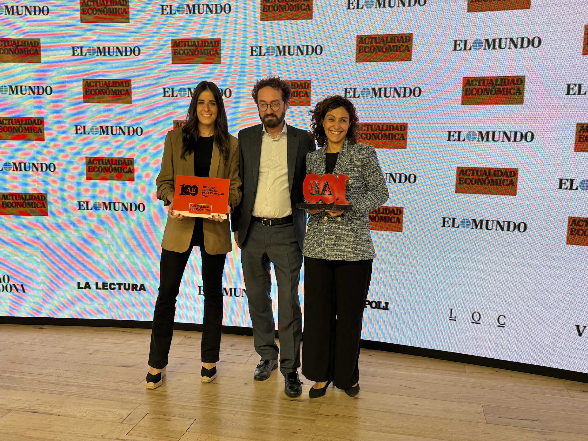 People standing with awards