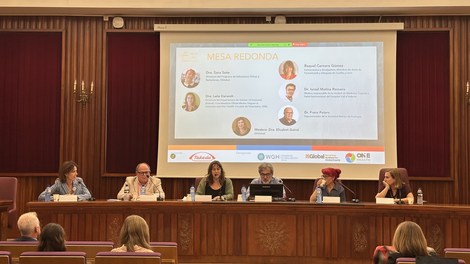 People presenting at conference