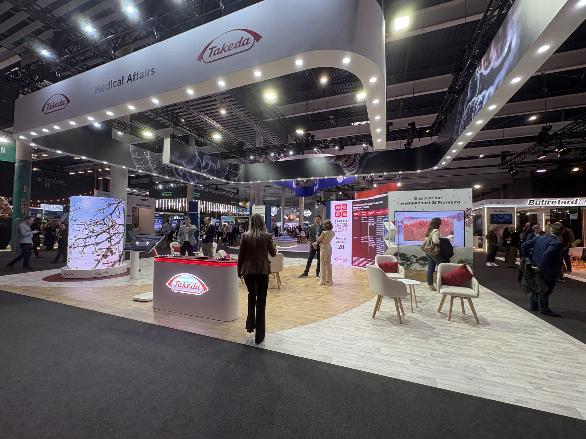 Photograph of Takeda pharmaceutical exhibition booth at a medical conference