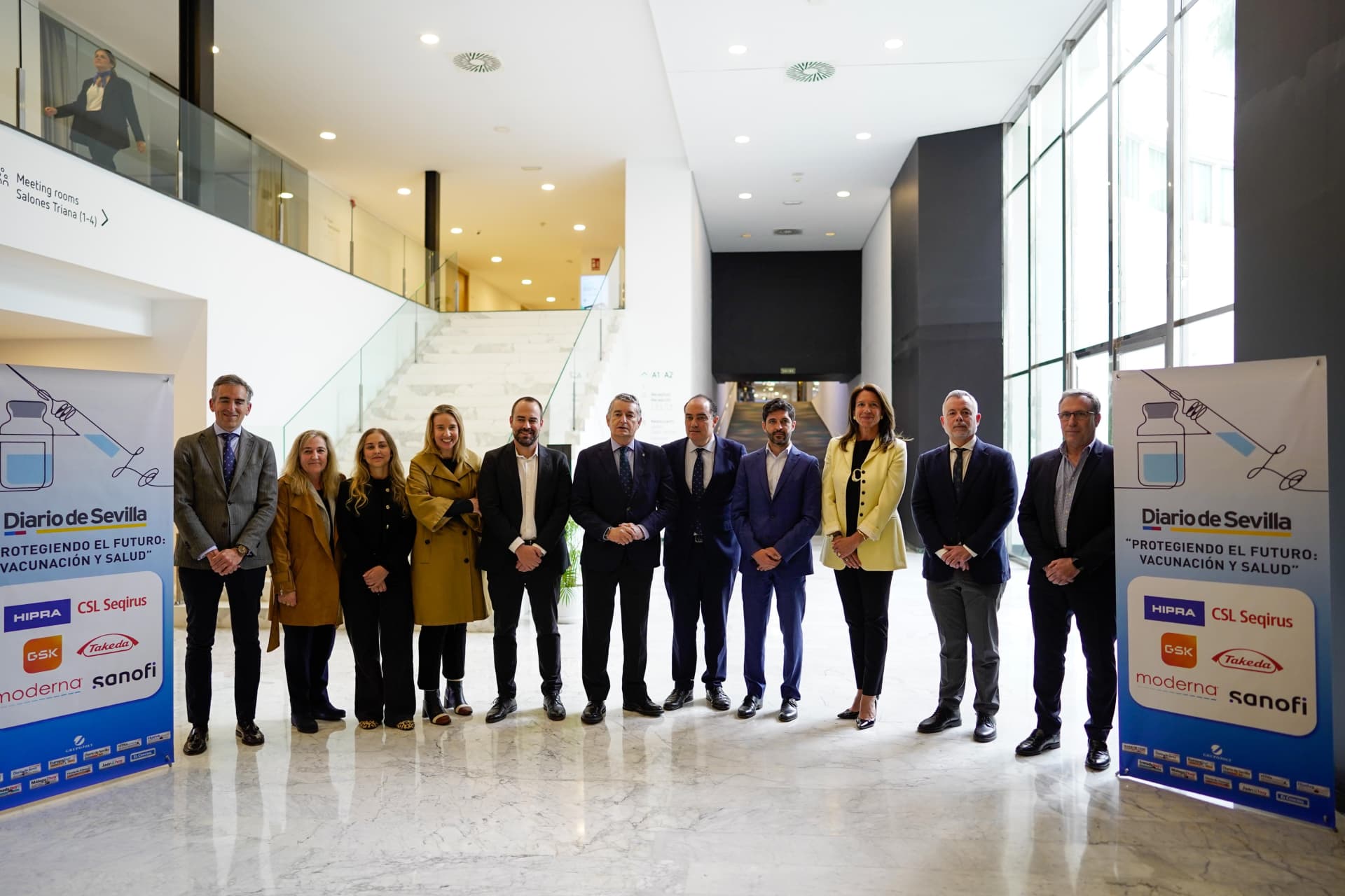 People in a conference posing for a picture