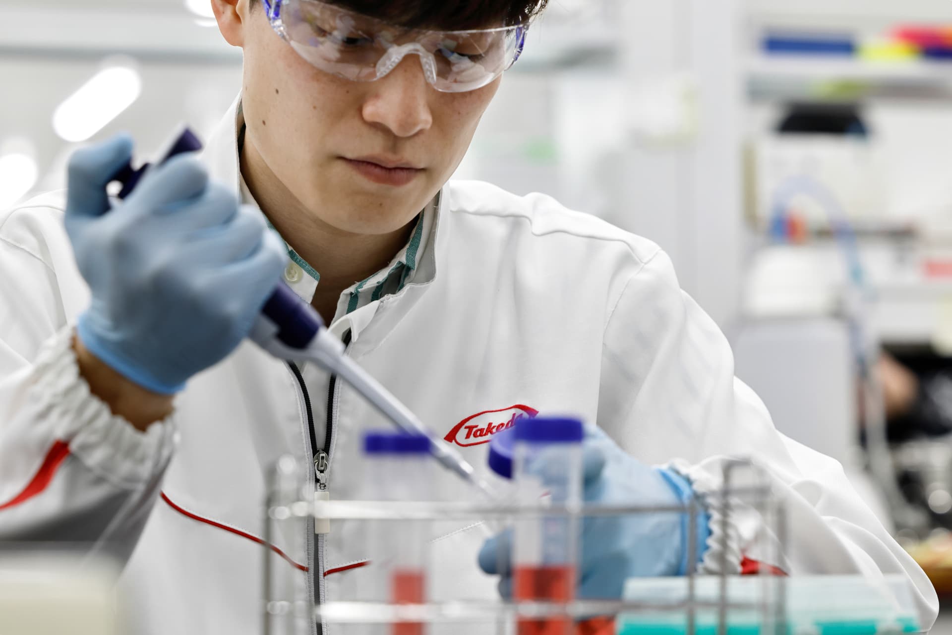 Man with lab Takeda coat