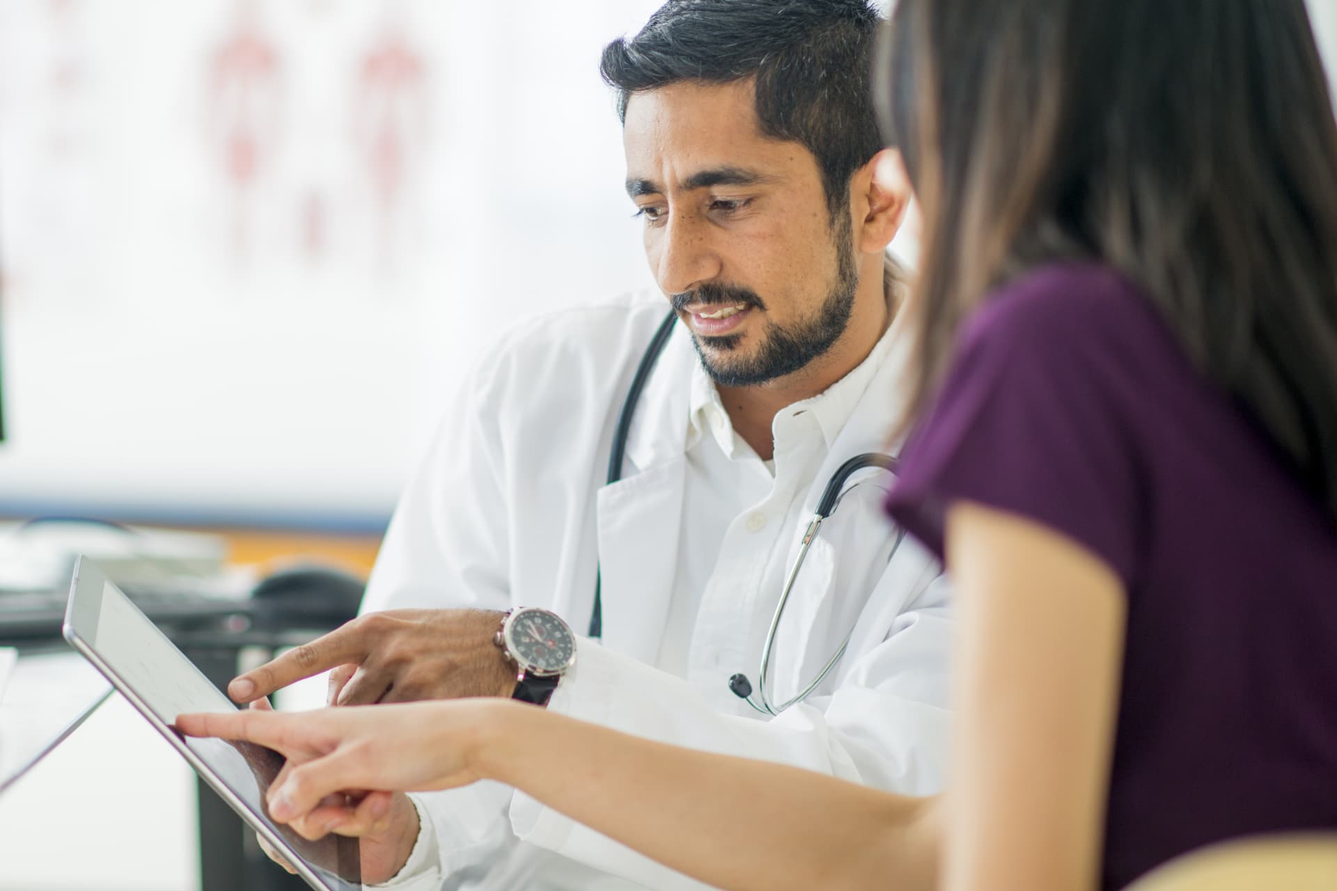Doctor talking to patient