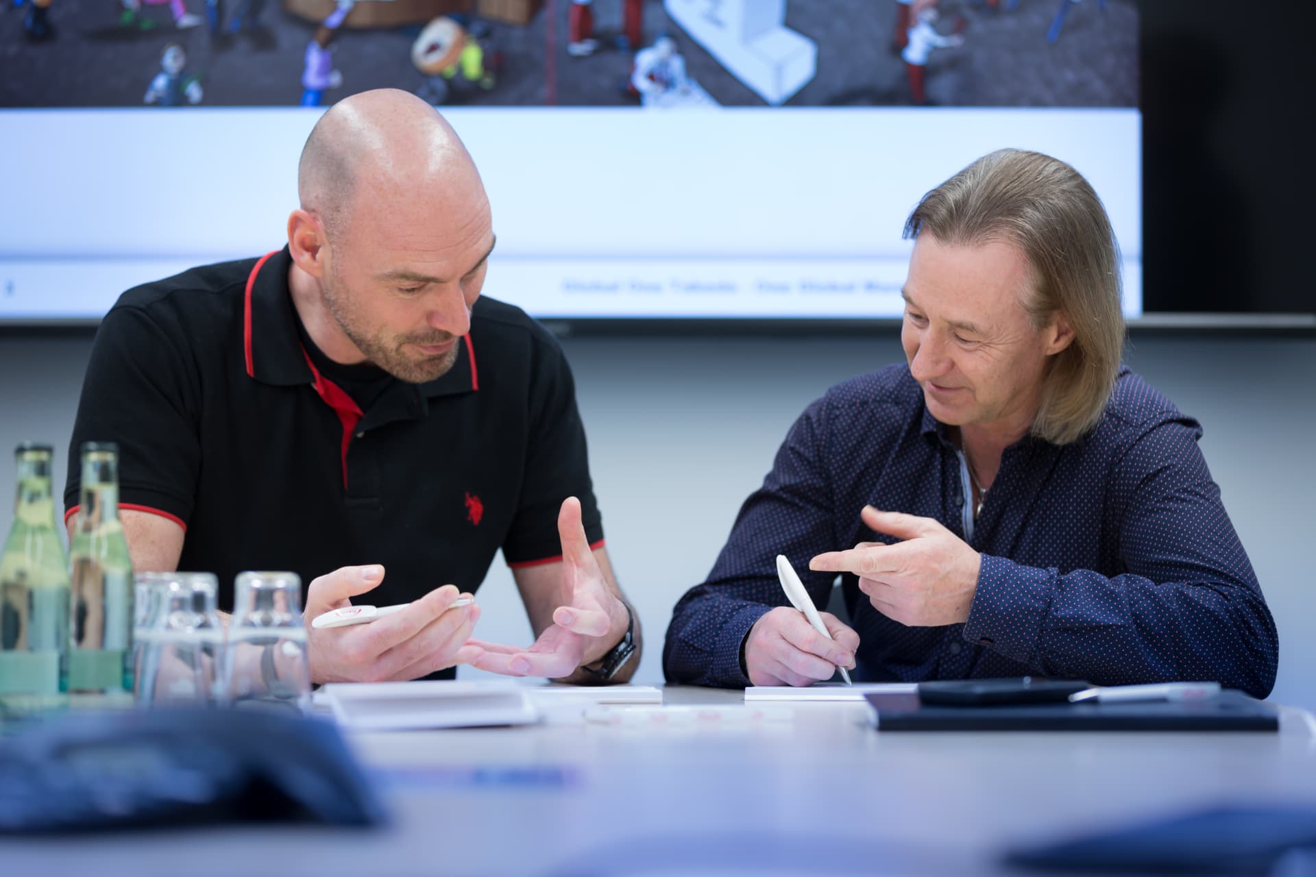 Two people collaborating
