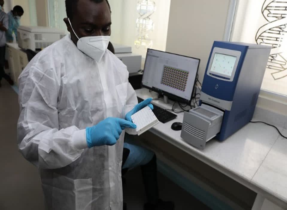 a physician in a lab showing some results