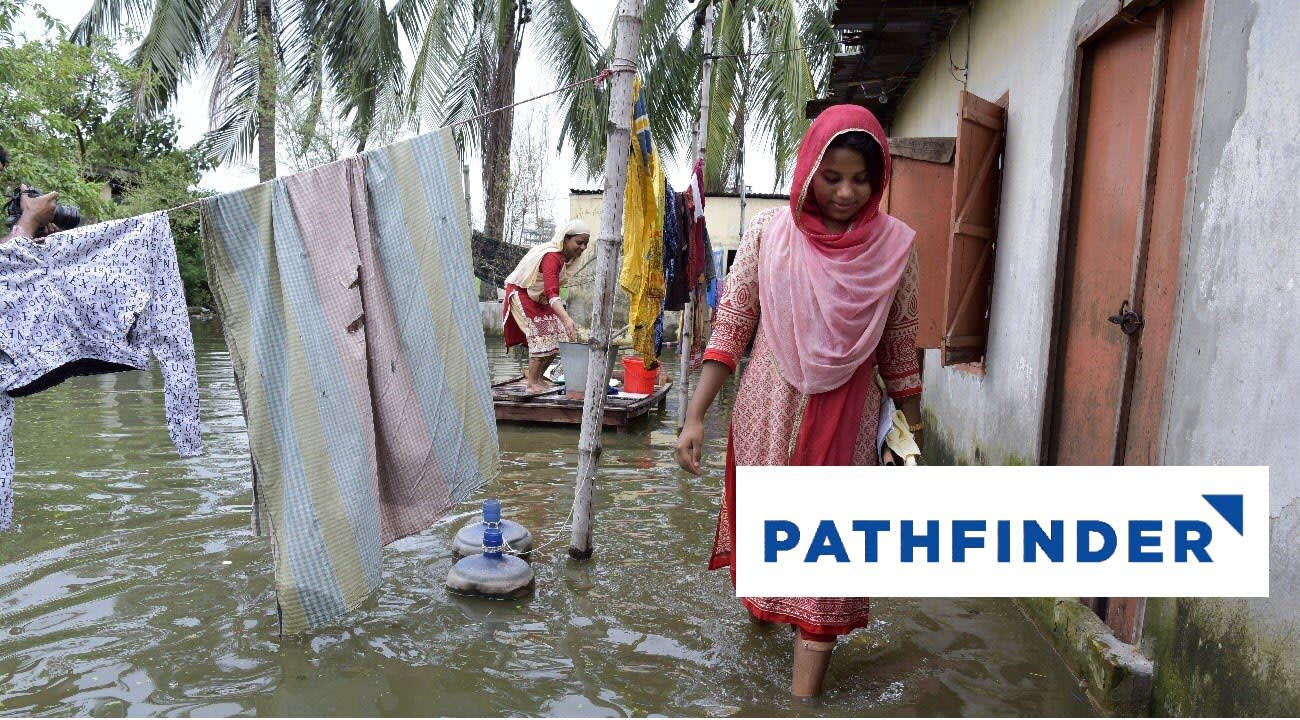 woman walking through flooding