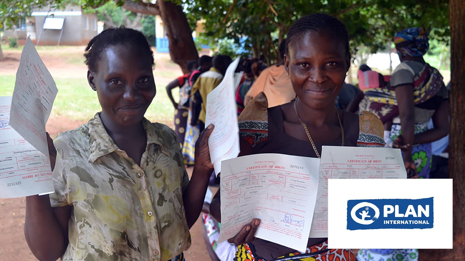 Two women with digitalized certificate of birth