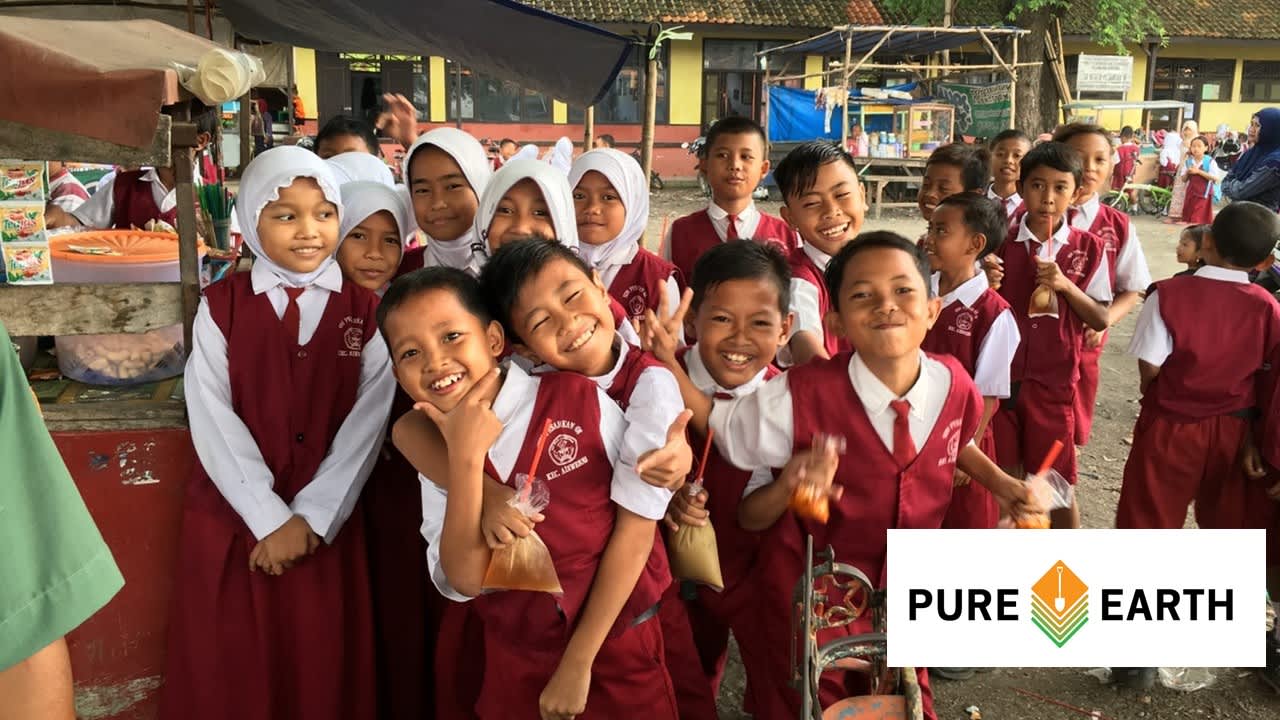 a group of children smiling