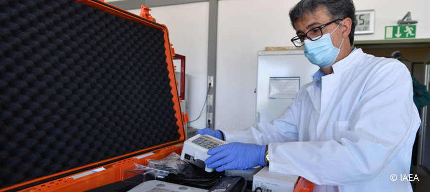 Scientist with testing device