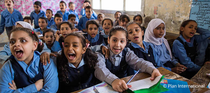 Kids in classroom screaming in surprise