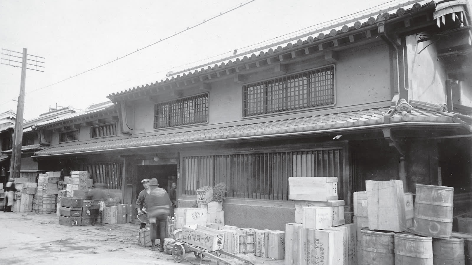 two men unloading boxes