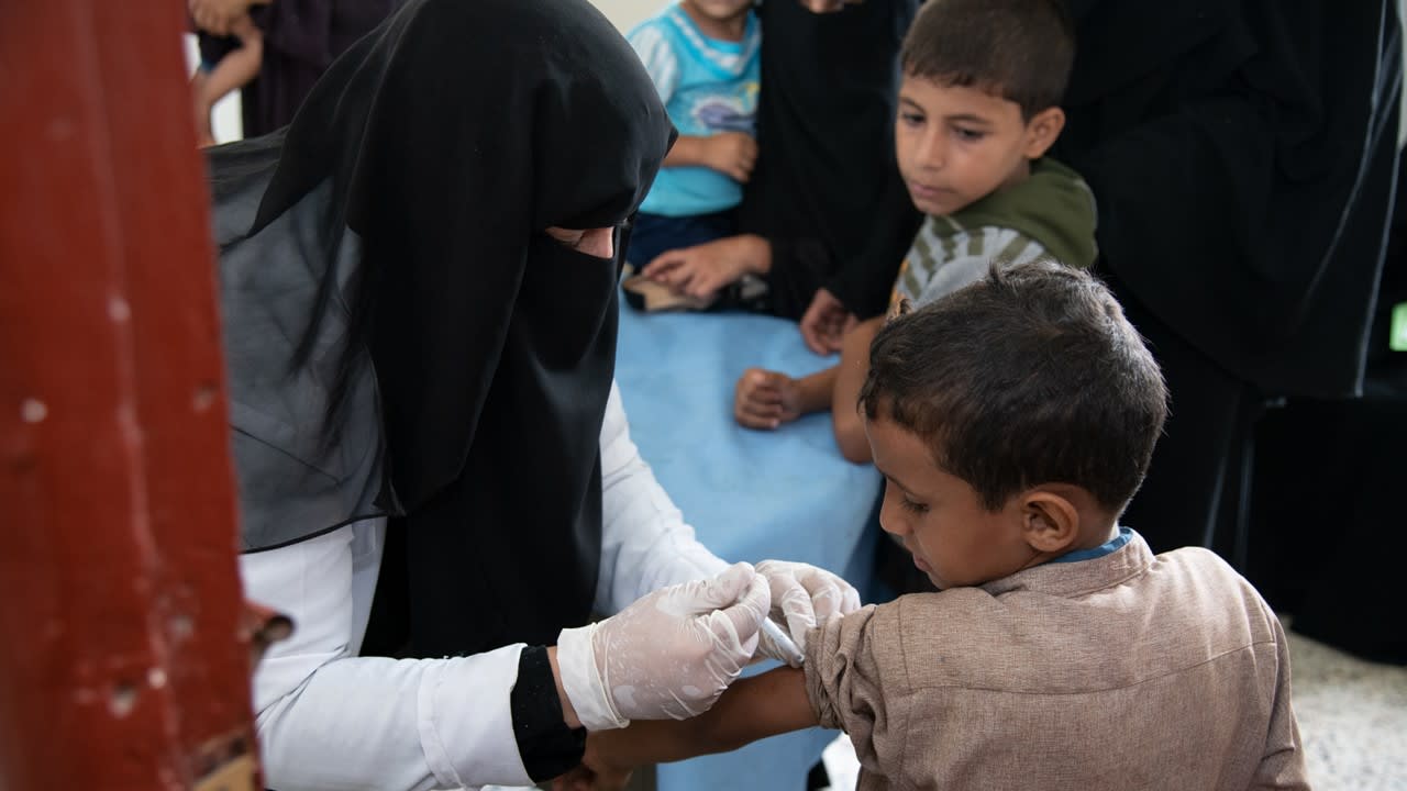 Child receiving vaccine