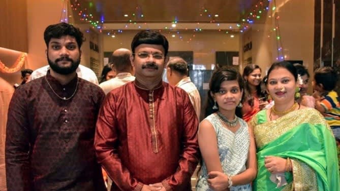 Amol Jadhav, second from left, celebrates Diwali with his son Atharva, far left, and family