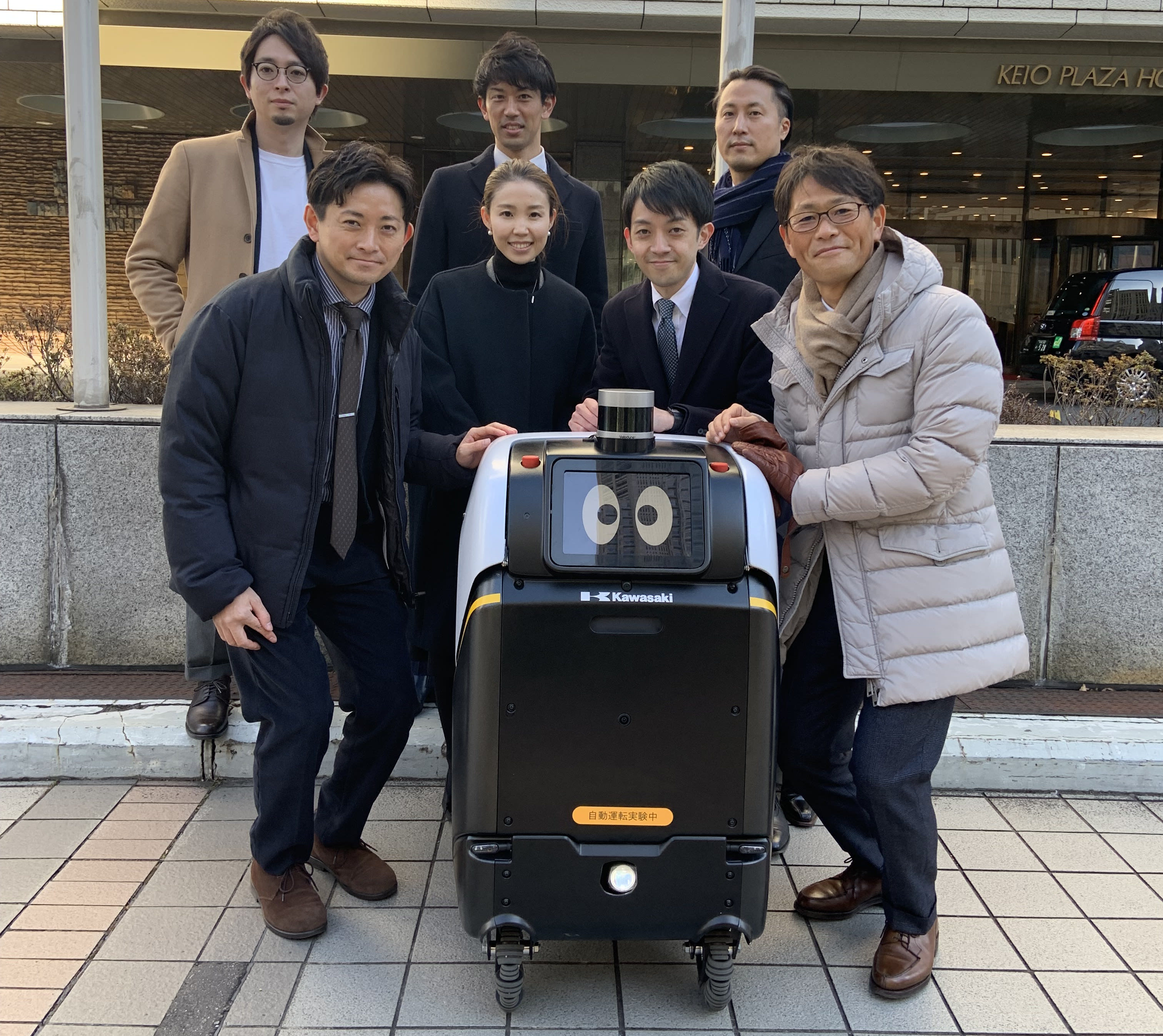 The Takeda team in Japan proudly posing with the robot used to collect medical devices