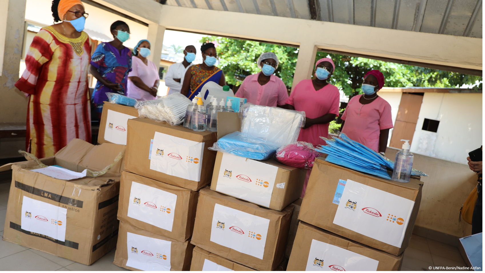 group of people with boxes