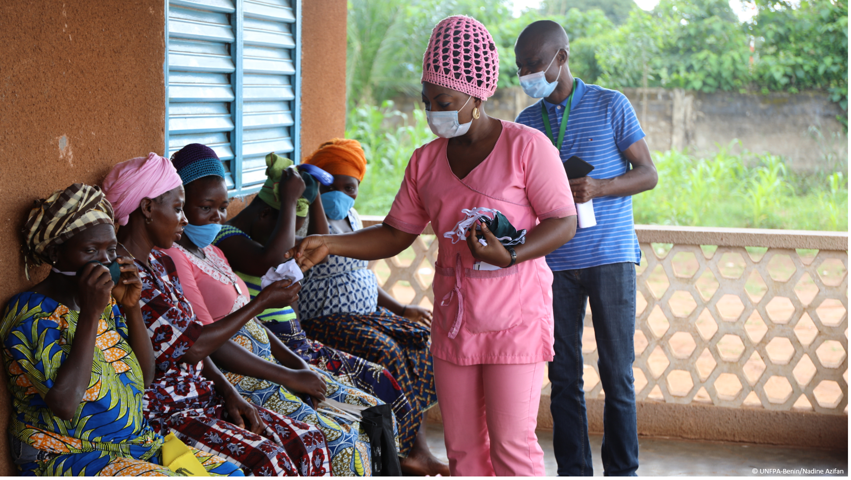 nurse giving face masks