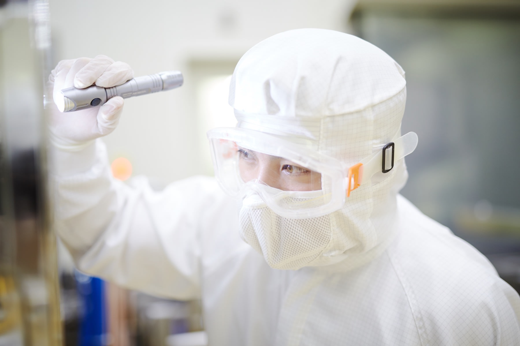 Scientist with flashlight